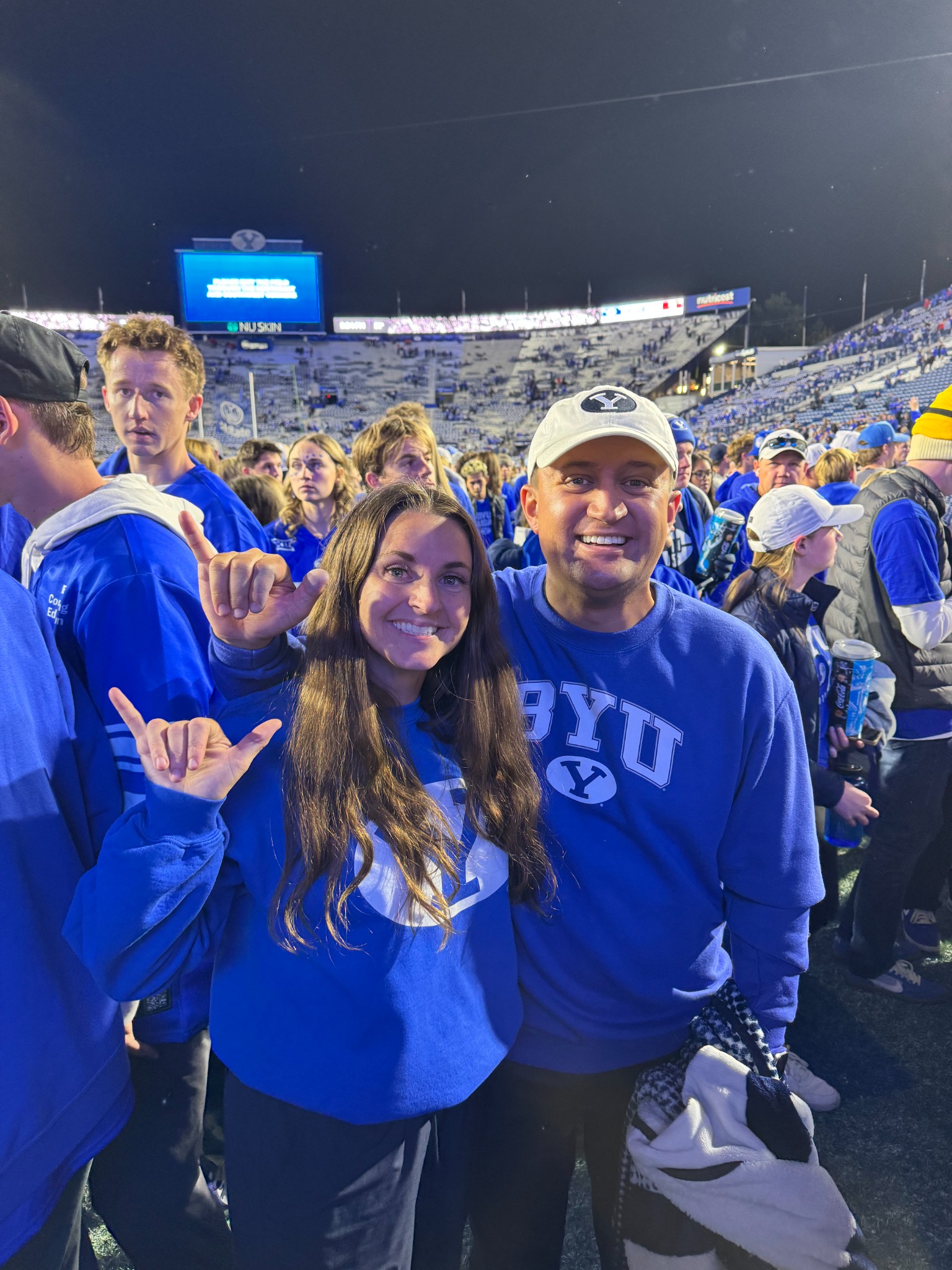 Nik and Kyrstin Anderson at a BYU football game